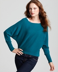 This BCBGMAXAZRIA sweater plays with proportions, flaunting a stylish cropped silhouette and drapey dolman sleeves.