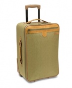 A world traveler. Expanding for more space, this charming suitcase packs in the features that jet-setters demand, such as two separate packing areas, restraining straps to secure garments and a removable hanging travel kit that features a waterseal pocket, elastic storage area and mesh pocket for all of your toiletries. The antique brass hardware and Hartmann's signature trim add a sophisticated look to your travel style. Lifetime warranty.