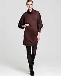 A classic alternative to her celebrated wrap dresses, this DIANE von FURSTENBERG sweater dress is fashioned with stylish Dolman sleeves in a smooth jersey wool.