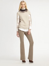 Plush rib-knit cashmere, in a sculptural pullover silhouette with unique split sides.TurtleneckSplit sides with attached back drapeAllover rib-knitCashmereDry cleanMade in Italy of imported fabricModel shown is 5'11 (180cm) wearing US size Small. 