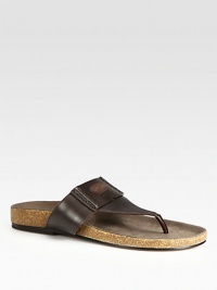 Thong sandal with embossed iconic logo detail.Leather upperRubber soleMade in Italy