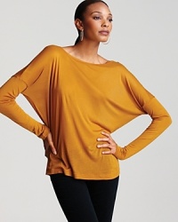 Elevate everyday chic with this Kain Label dolman-sleeve tee, saturated in rich color.