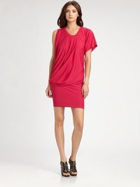 Soft, vibrant jersey, tailored in an asymmetrical silhouette with a flattering side drape.Banded jewel necklineSingle short sleeveFront and back pleatsAsymmetrical side drapeAbout 23 from natural waist68% acetate/27% polyester/5% spandexHand washMade in USA of imported fabricModel shown is 5'10 (177cm) wearing US size Small. 