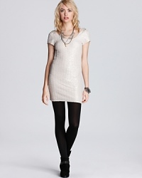 This Free People dress brings on the heat, in a shining metallic fabric with a sultry plunging back.