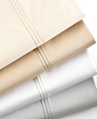 Crafted of the finest pima cotton, this 500 thread count Pinktuck Sateen fitted sheet from Barbara Barry evokes a truly elegant feel and luxuriously soft hand. Choose from an array of soft hues.