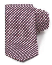 Vintage-inspired with a modern skinny width, this soft silk tie brings the best of both worlds to your polished attire, whether you're off to work or heading out to dinner.