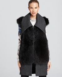 Luxe fur adorns this plush wool Vera Wang vest with oversized collar.