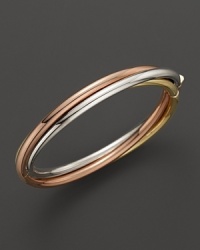 A classic bangle in 18K yellow, rose and white golds. From Roberto Coin.