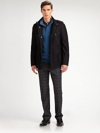 An outerwear essential for the approaching cold weather days, structured in a superior wool blend with a zip and button placket and front pockets for maximum versatility.Zip frontStand collarZippered chest, waist flap pocketsShoulder epaulettesFully linedAbout 30 from shoulder to hem80% virgin wool/20% polyamideDry cleanImported