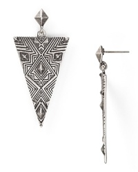 For the boho babe: this pair of House of Harlow 1960 earrings flaunts geometric allure, in triangle shapes, that are engraved for an added edge.