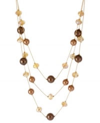 Style comes in layers in this illusion necklace from Kenneth Cole New York. Crafted from gold-tone mixed metal, the necklace is draped with brown glass pearls and beads for a visually stunning effect. Item comes packaged in a signature Kenneth Cole New York Gift Box. Approximate length: 16 inches + 3-inch extender. Approximate drop: 3 inches.