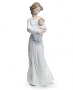 Remember these early memories forever with Lladró. A young mother holds her child with a glance of pure serenity and love. Makes the perfect gift for any mother.