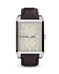 Armani Exchange's sleek collection of watches are always in demand. With a classic leather strap and angular face, this stainless steel style is smart enough for the office and cool enough to take off the clock.