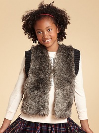 With a lush faux-fur front and a chunky knit back, this textural vest is a just-right blend of cozy and chic.Open front with button closureSleeveless with ribbed trimCotton liningFaux-fur front: 67% acrylic/17% modacrylic/16%polyesterSweater back: 63% acrylic/20% polyester/17% modacrylicDry cleanImported