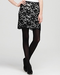 This exquisite on-trend lace Theory skirt offers an iconic color contrast and a chic new view on the modern mini.