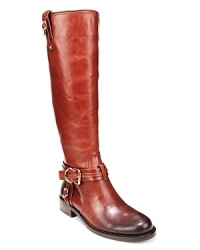 Shining harness hardware pops against refined leather in these work-or-play appropriate VINCE CAMUTO riding boots.