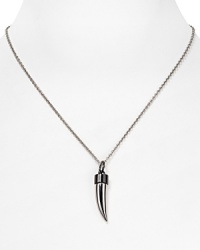 A little bit edgy, a little bit glam. This horn-shaped Rebecca Minkoff pendant is a uniquely designed signature, finished in mixed metallic tones.