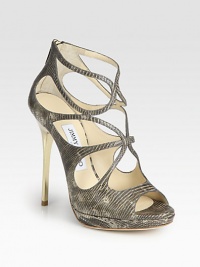 Strappy platform silhouette of lizard-embossed leather with a sleek goldtone heel. Metal heel, 4¾ (120mm)Covered platform, ½ (15mm)Compares to a 4¼ heel, (110mm)Lizard-embossed leather upperBack zipLeather lining and solePadded insoleMade in ItalyOUR FIT MODEL RECOMMENDS ordering one half size up as this style runs small. 