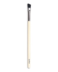 A small, soft angled brush to shape eyebrows. Made of boar bristle.