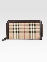 Iconic check design, trimmed and lined in supple leather, with a zip-around closure. Zipper closure Inside middle zipper pocket, 12 credit card slots, two bill slots Leather lining 7½W X 4H X 1D Imported Please note: Position of logo may vary.