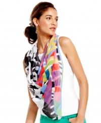 With vibrant hues and patterns reminiscent of Brasil, this layering wrap from Collection XIIX lends a summery appeal.