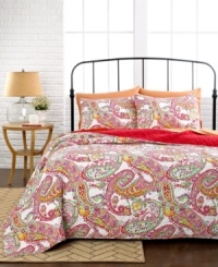 Its wake up time...add a tropical punch to your space with designs and colors that really pop! This Katia quilt features a perfect paisley pattern with quilted details all in hot hues. Reverses to solid.