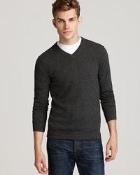 A surefire staple with unique designer flair, this V-neck sets the tone for your handsome sweater collection.