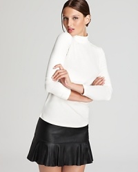 A closet essential, this sleek RAOUL turtleneck is crafted with a hint of stretch for a flawless silhouette.