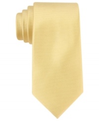 One bold stroke. Make a singular style statement with this solid skinny tie from Tommy Hilfiger.