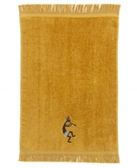 Embodying the spirit of music, the Native American deity Kokopelli dances his way across this charming fingertip towel. Woven from sheared cotton velour with a polyester band.