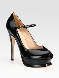 Ultimate feminine peep toe silhouette of shiny patent leather, with a towering heel and adjustable ankle strap. Self-covered heel, 5½ (140mm)Island platform, 1¼ (30mm)Compares to a 4¼ heel (110mm)Patent leather upperPeep toeLeather lining and solePadded insoleMade in ItalyOUR FIT MODEL RECOMMENDS ordering one size up as this style runs small. 