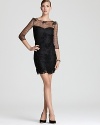 Delicate floral lace lends a high fashion look to ABS by Allen Schwartz' utterly sophisticated frock.