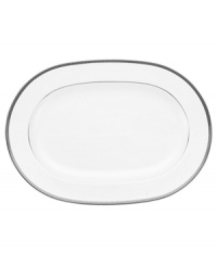 Go platinum. A solid band and three tiers of sparkling squares in white porcelain give the Pembroke Platinum oval platter a look that's festive yet refined. A brilliant addition to a contemporary dinnerware collection by Noritake.