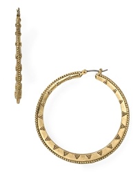 Inspired by exotic locales, this pair of textured gold-plated hoop earrings from Lauren Ralph Lauren will lend far away allure to your look.