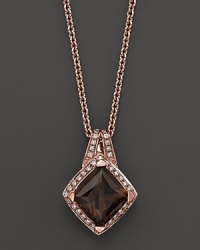 Pavé diamonds frame a glittering smoky quartz set in 18K pink gold. 18K pink gold chain.