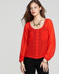 A fiery hue enlivens this Patterson J. Kincaid blouse that's just as statement-making with office-perfect pencil skirts as it is with your favorite jeans.