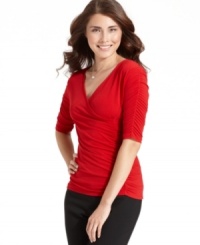 Style&co.'s ruched silhouette ensures a flattering petite fit. Try with sleek black pants or tucked into a skirt!