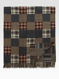 Preppy checks and tartan accents elevate this sophisticated throw crafted from fine Italian wool.Fringed ends55 x 67WoolDry cleanMade in Italy