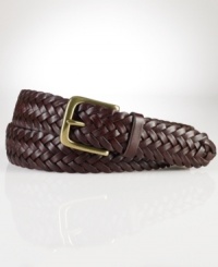 A sleek braided belt exudes timeless style in a supple leather construction.