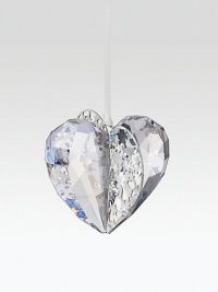 An innovative technique cleverly combines faceted crystal with pierced silvertone metal in a graceful, shimmery design to add dazzle to any tree.CrystalSilvertoneAbout 2H X 2.75WMade in Austria