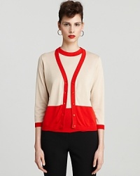 Channel mod-chic in this color block kate spade new york cardigan. Play up the vibrant hue with a bold red lip for a look brimming with retro appeal.