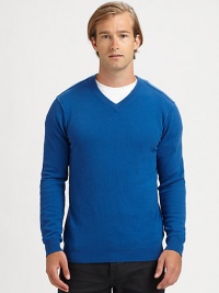 A wardrobe staple you'll want to live in all year round, this v-neck pullover is woven in fine cashmere in a modern-fit silhouette that pairs easily with your suiting trousers or your favorite pair of denim.V-neckRibbed knit collar, cuffs and hemCashmereHand washImported