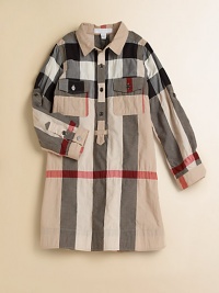 Fun smock styling in her favorite designer check.Pattern varies Spread collar Button placket Button flap chest pockets Side seam pockets Long sleeves with button tab roll cuffs Shirring below back shoulder yoke 97% cotton/2% nylon/1% elastane Machine wash Imported