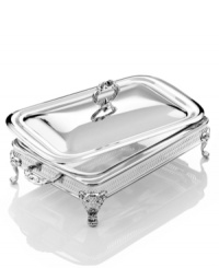 Ornate detail in resplendent silver plate lends this Godinger baker to your most elegant dining occasions. A domed lid keeps the meal warm and makes for a dramatic presentation.