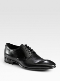 Let this classic lace-up, crafted from superior calfskin leather, be the foundation of your tailored dress wardrobe.Leather upperLeather liningPadded insoleRubber soleImported