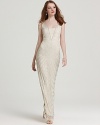 Intricately bedecked in shimmering beads, this Aidan Mattox gown exudes vintage-inspired glamour.