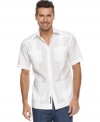 You'll have a pocketful of style and comfort with this embroidered, paneled shirt from Cubavera.