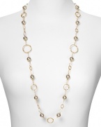 Pearls are a classic choice, yet Majorica gives them a modern spin. With contemporary gold loops and delicate stations, this piece exudes cool sophistication.