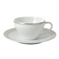 Hailing from the legendary region of Limoges, France, Bernardaud has been crafting fine porcelain creations of exquisite beauty for over 100 years. This elegant, contemporary design, punctuated by platinum, hand-rendered bubbles, is the perfect excuse for a celebration. (Saucer only)