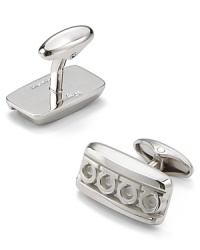 When you want less polish on your French cuff but don't want to skimp on refinement, reach for these stately cufflinks with their masculine stone and brass design. From Salvatore Ferragamo.